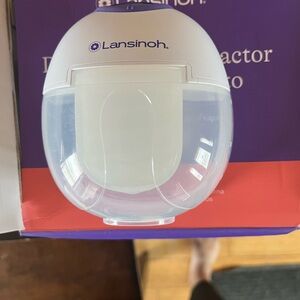 Lansinoh Milk Collector in White and Clear